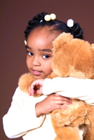 image of little girl with teddy-bear